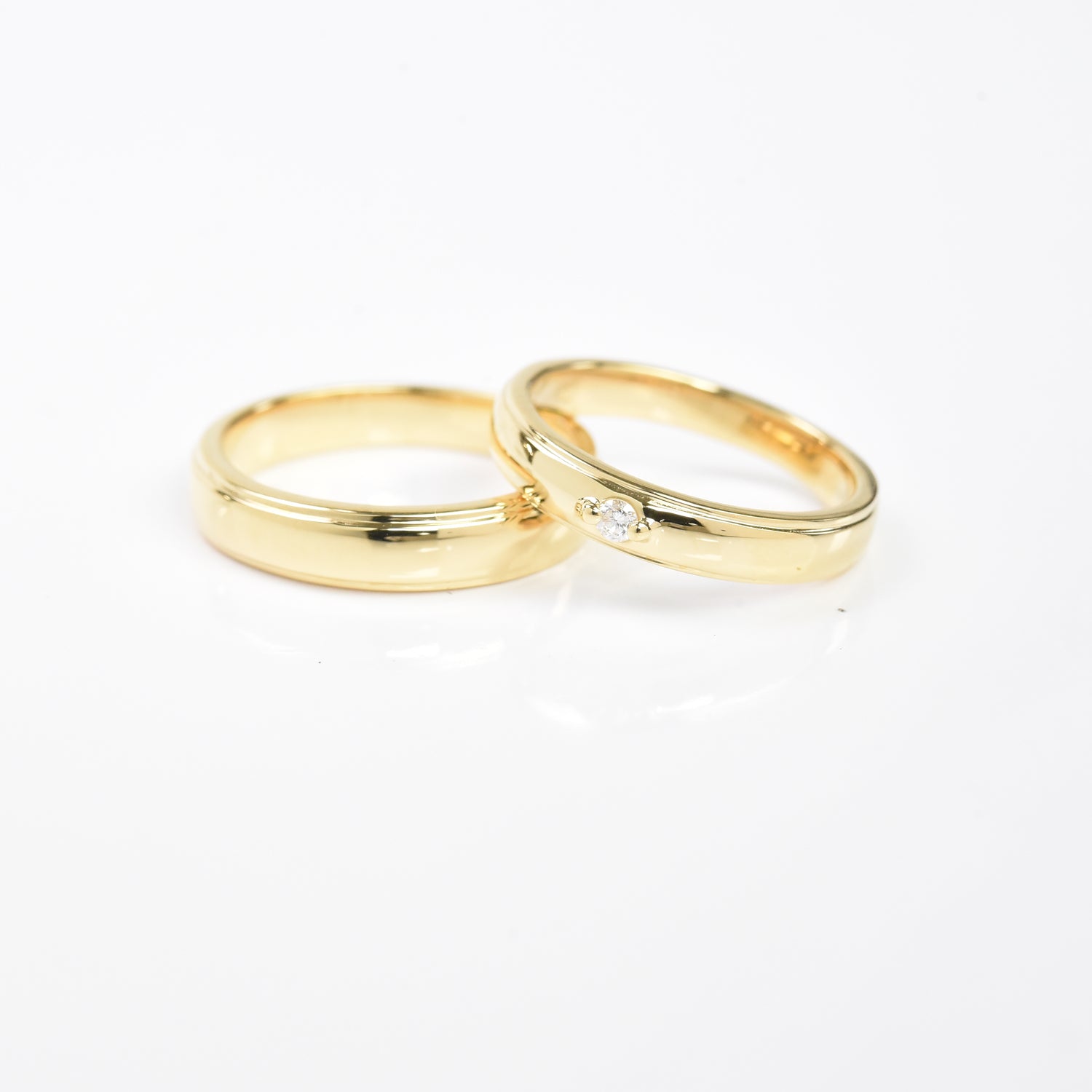 Gold Band with a Solitaire Ring